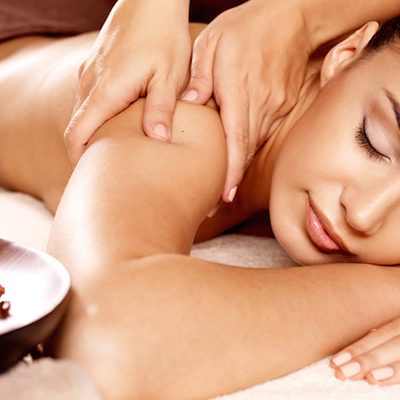Woman having massage in the spa salon